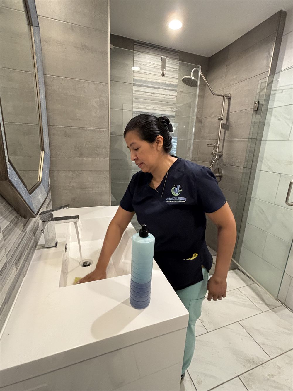 Starbiz Cleaning professional cleaning a client bathroom in North Atlanta